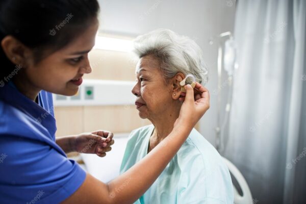 elderly-woman-with-hearing-aid_53876-23586